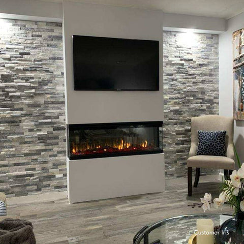 Touchstone Sideline Infinity 50 inch smart electric fireplace in living room with stone wall