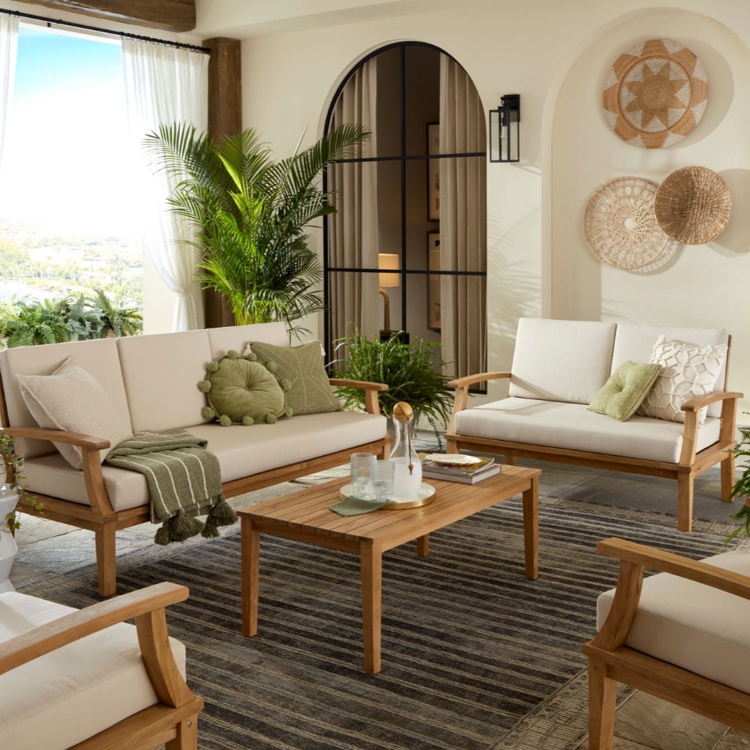 Touchstone Solena Teak Sofa Set lifestyle image at an angle.