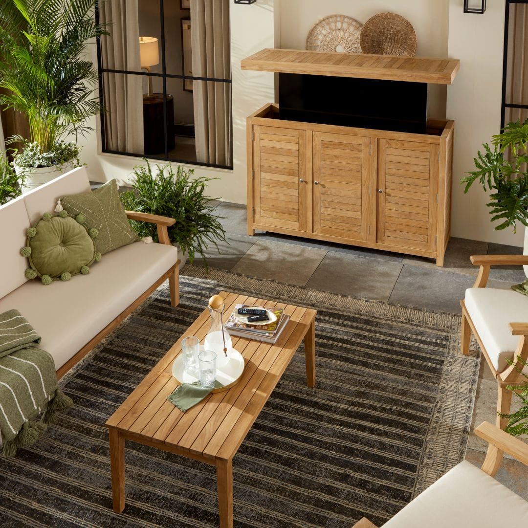 Touchstone Solena Teak Sofa Set lifestyle image from a high angle.