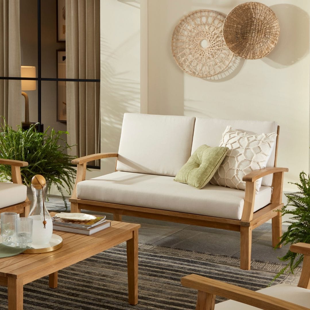 Touchstone Solena Teak Sofa Set lifestyle image, close up of two seat sofa