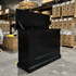 Black Elevate TV Lift Cabinet showroom unit photographed in the warehouse.
