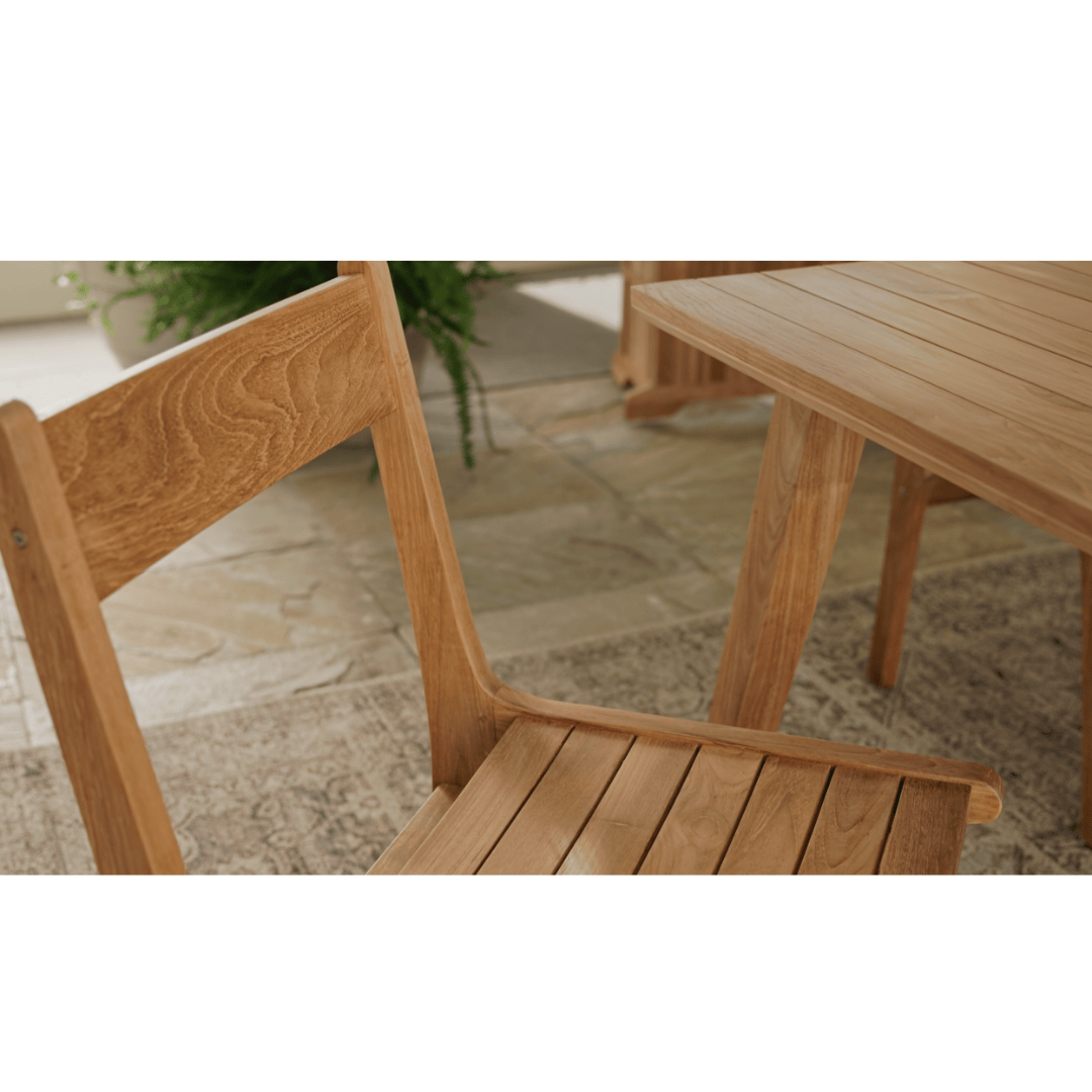 Touchstone Eluna Teak Outdoor Dining Set Lifestyle Photo of chair