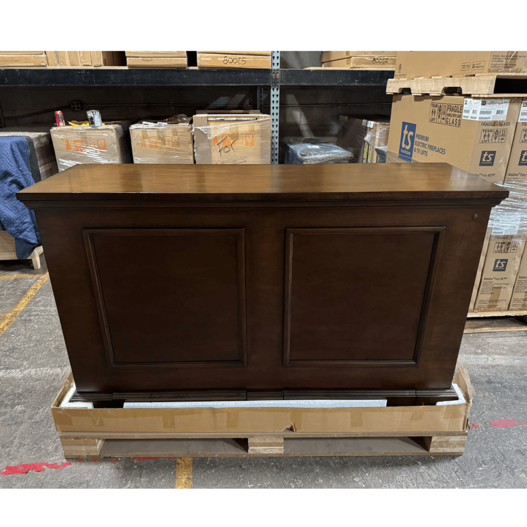 Grand Elevate open box tv lift cabinet photographed in the warehouse.