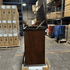 Grand Elevate open box tv lift cabinet photographed in the warehouse.