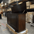Grand Elevate open box tv lift cabinet photographed in the warehouse.