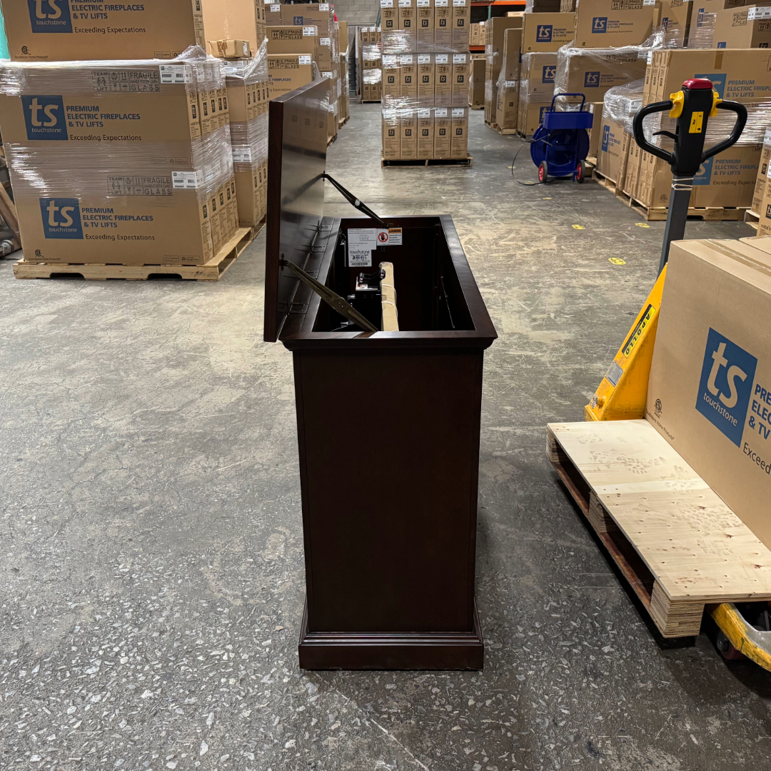 Touchstone Mini Elevate Smart TV Lift Cabinet in espresso finish photographed in the warehouse - showroom unit.