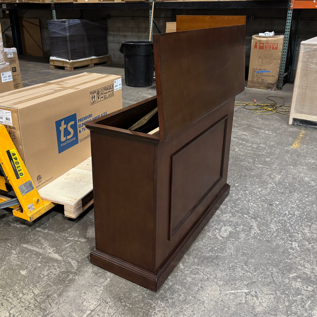 Touchstone Mini Elevate Smart TV Lift Cabinet in espresso finish photographed in the warehouse - showroom unit.