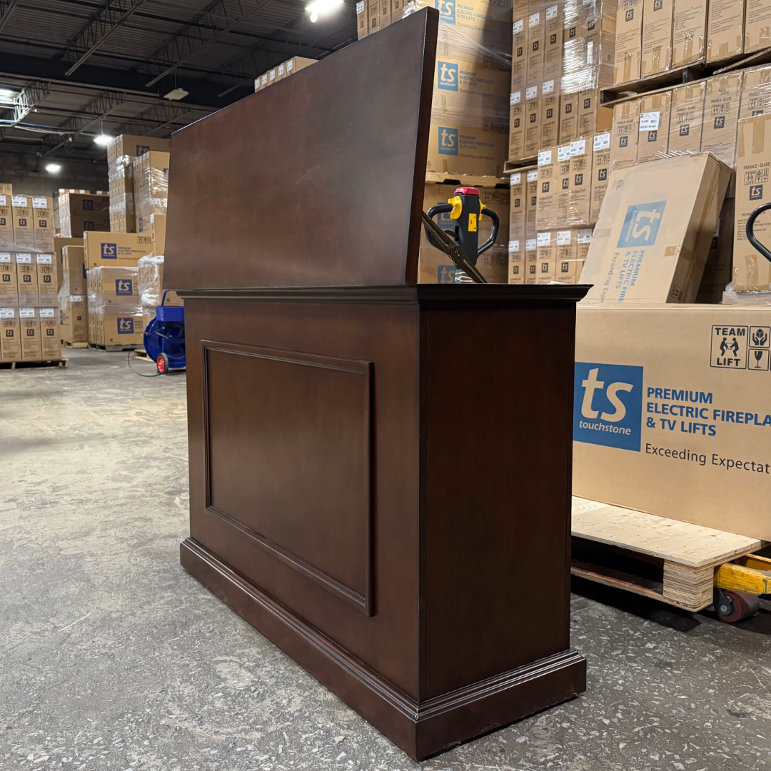 Touchstone Mini Elevate Smart TV Lift Cabinet in espresso finish photographed in the warehouse - showroom unit.