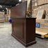 Touchstone Mini Elevate Smart TV Lift Cabinet in espresso finish photographed in the warehouse - showroom unit.