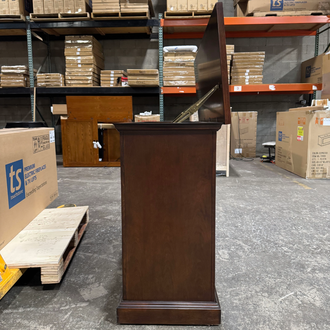 Touchstone Mini Elevate Smart TV Lift Cabinet in espresso finish photographed in the warehouse - showroom unit.