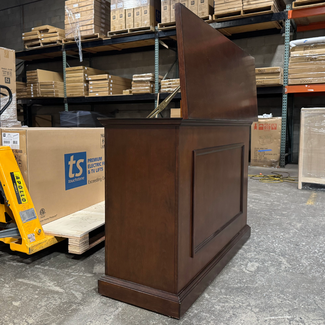 Touchstone Mini Elevate Smart TV Lift Cabinet in espresso finish photographed in the warehouse - showroom unit.