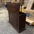 Touchstone Mini Elevate Smart TV Lift Cabinet in espresso finish photographed in the warehouse - showroom unit.