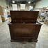 Touchstone Mini Elevate Smart TV Lift Cabinet in espresso finish photographed in the warehouse - showroom unit.
