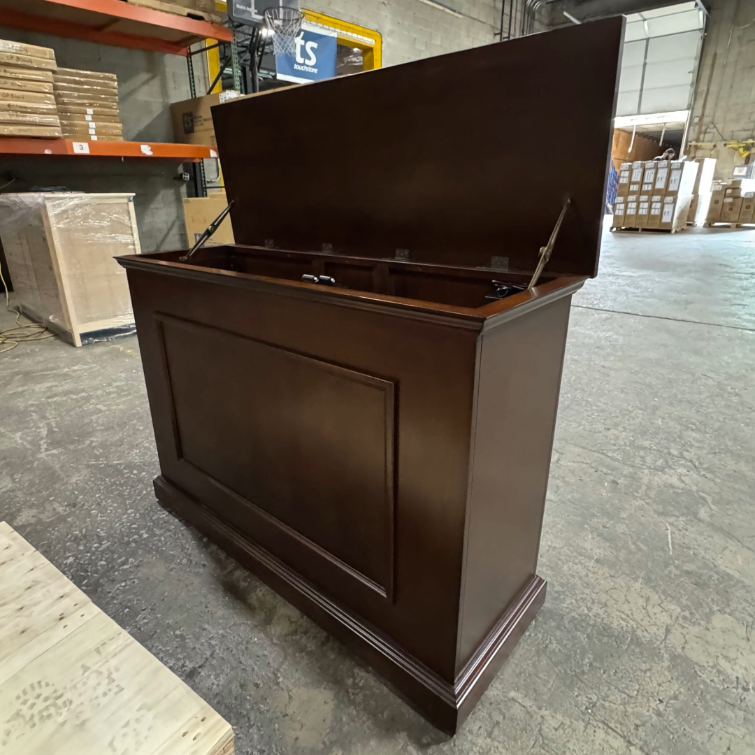 Touchstone Mini Elevate Smart TV Lift Cabinet in espresso finish photographed in the warehouse - showroom unit.