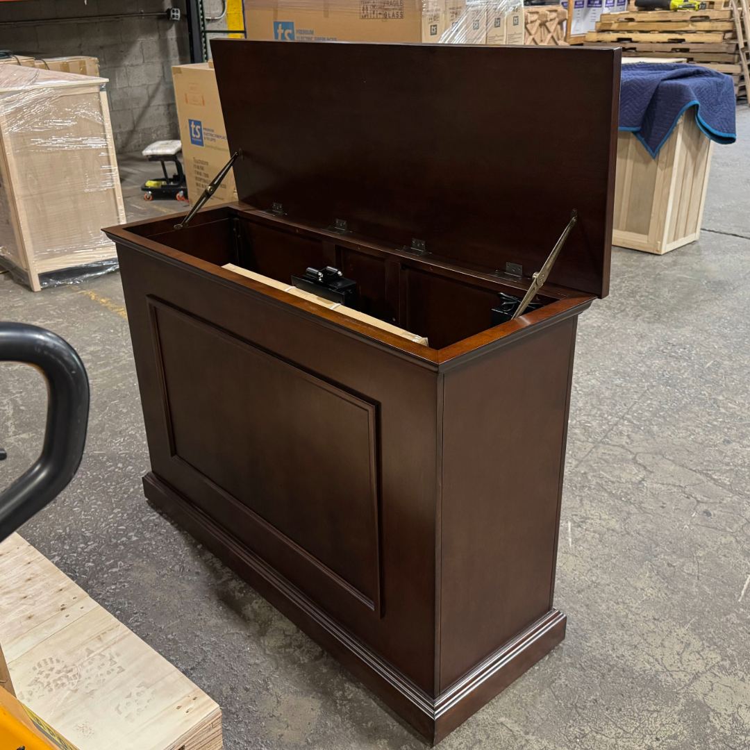 Touchstone Mini Elevate Smart TV Lift Cabinet in espresso finish photographed in the warehouse - showroom unit.