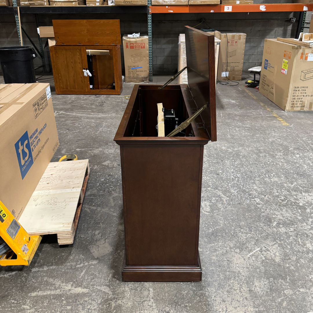 Touchstone Mini Elevate Smart TV Lift Cabinet in espresso finish photographed in the warehouse - showroom unit.