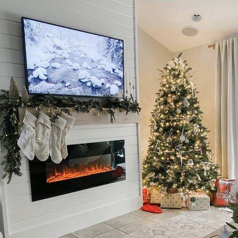 Touchstone Onyx Electric Fireplace in half wall shiplap with Christmas decor by @nykie_designs