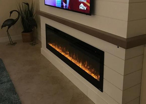 Touchstone Sideline 72 Electric Fireplace in a white brick wall