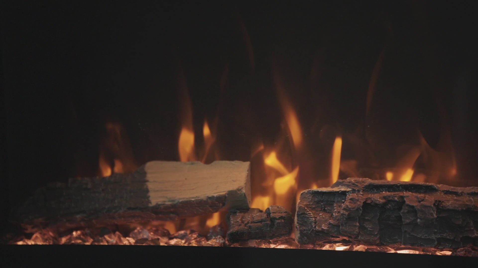 Touchstone Fireplug electric fireplace close up video of flames and ember bed media