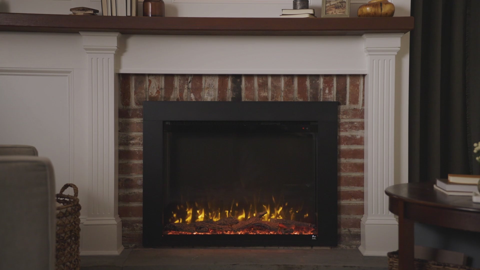 Touchstone Fireplug Pro Electric Fireplace video showing a room setting with the flames on.
