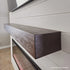 Customer image of the Touchstone espresso mantel in a room setting.