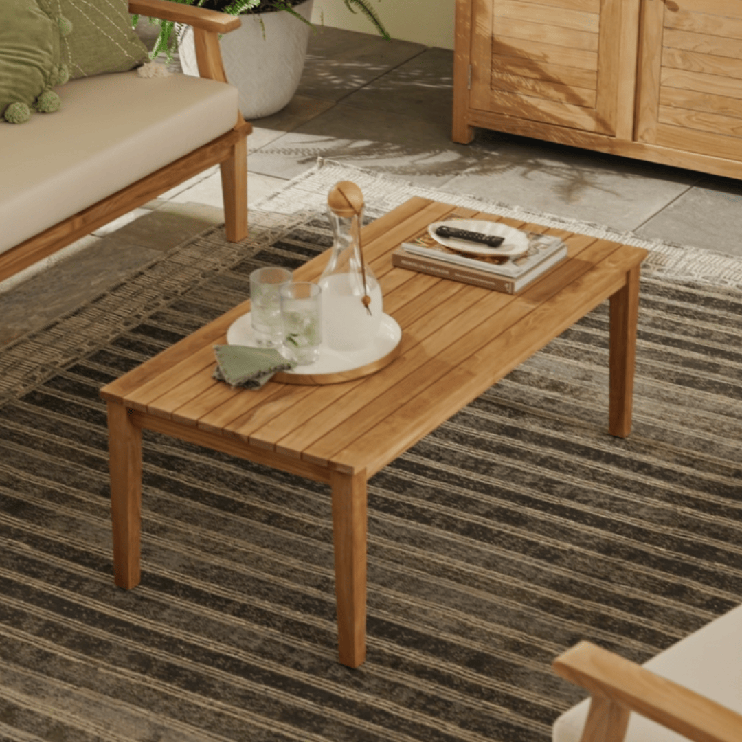 Touchstone Solena Teak Outdoor coffee table lifestyle photo
