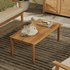 Touchstone Solena Teak Outdoor coffee table lifestyle photo