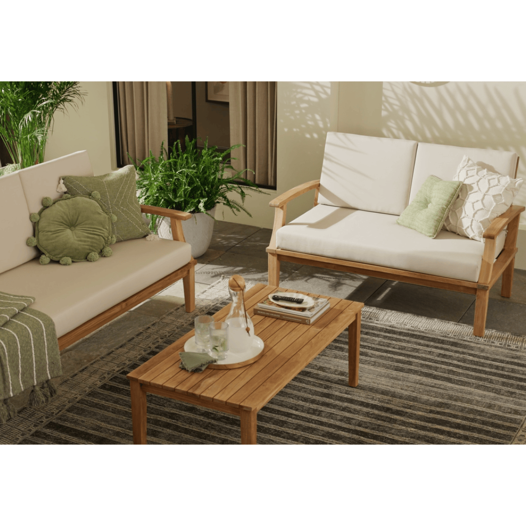 Touchstone Solena Teak Sofa Set angled lifestyle image