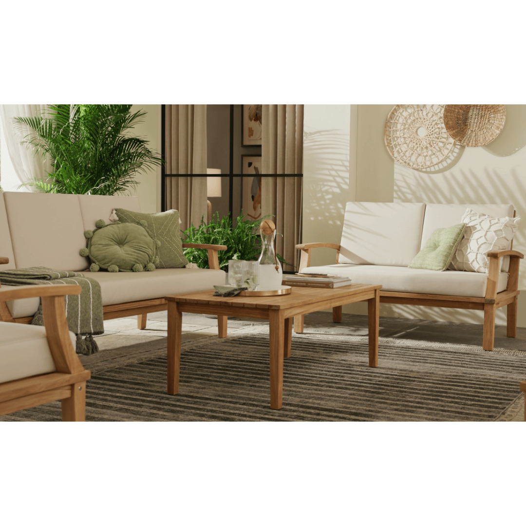 Touchstone Solena Teak Outdoor coffee table lifestyle photo with sofa set.