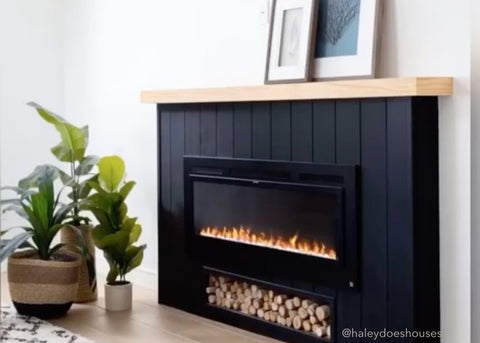 Touchstone Sideline Electric Fireplace surrounded by black shiplap by @haleydoeshouses