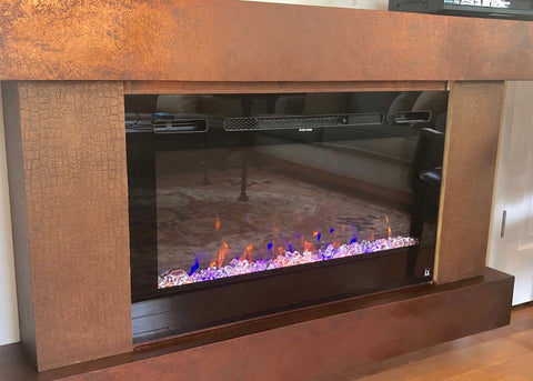 Sideline 36 Electric Fireplace framed by a rich wood mantel