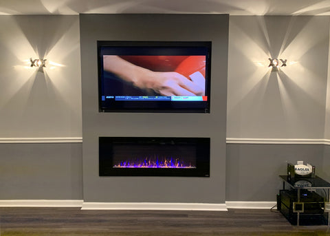 Touchstone Sideline 60 Electric Fireplace in gray wall with TV mounted above