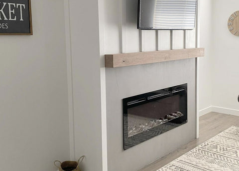 Sideline 50 Electric Fireplace with gray accent wall and mantel