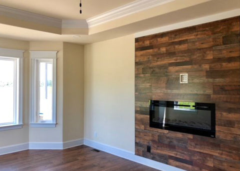 Sideline 50 Electric Fireplace in wood panel wall