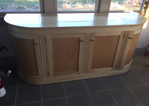 Custom built curved TV lift cabinet featuring Touchstone Whisper Lift