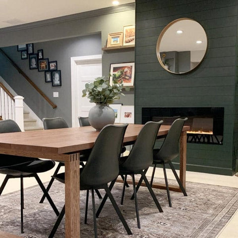 Touchstone electric fireplace in dining area in refinished basement