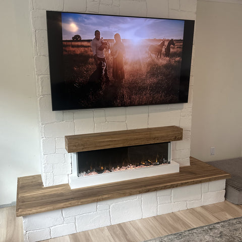 The Touchstone Chesmont Wall Mount Smart Electric Fireplace in faux brick wall by @tomazcoasttocoast