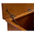 Touchstone Elevate 72009 Smart TV Lift Cabinet in Honey Oak Finish hinge detail photo on white.