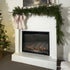 Touchstone Fireplug Pro Smart Electric Fireplace Insert 33 decorated for Christmas @elianagalbraith