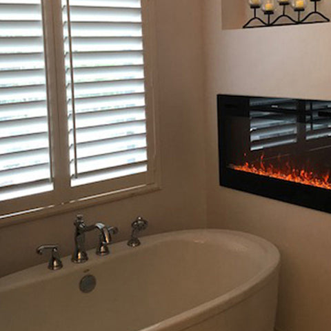 Touchstone Forte Electric Fireplace in bathroom by customer Jim
