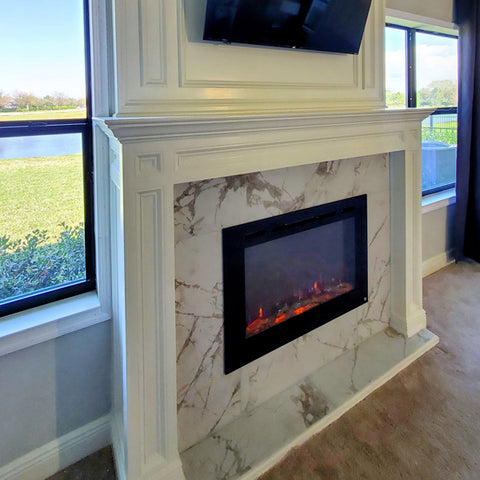 Touchstone Forte Electric Fireplace in marble mantel McKinnon Building Services