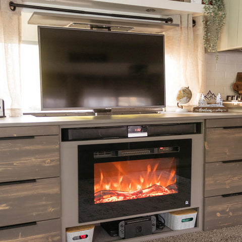 Touchstone SRV Pro TV lift mechanism and Sideline 28 Electric Fireplace in RV by @rockinandrollinofficial