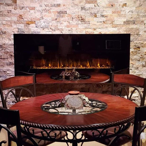 Touchstone wall mount electric fireplace in brick wall dining room by customer Theresa