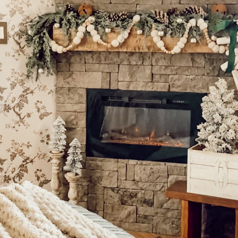 Touchstone Sideline 28 Electric Fireplace decorated for Christmas @our.nohai.home