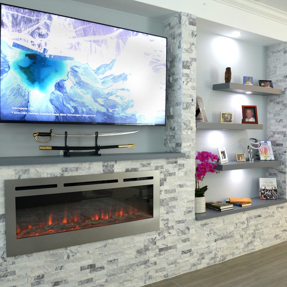 Sideline Deluxe Stainless Steel 86277 60 inch Recessed Smart Electric Fireplace shown in a room under a tv.