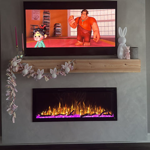 Touchstone Sideline Elite® 50 Smart Electric Fireplace decorated for Easter photo credit @sheee_will
