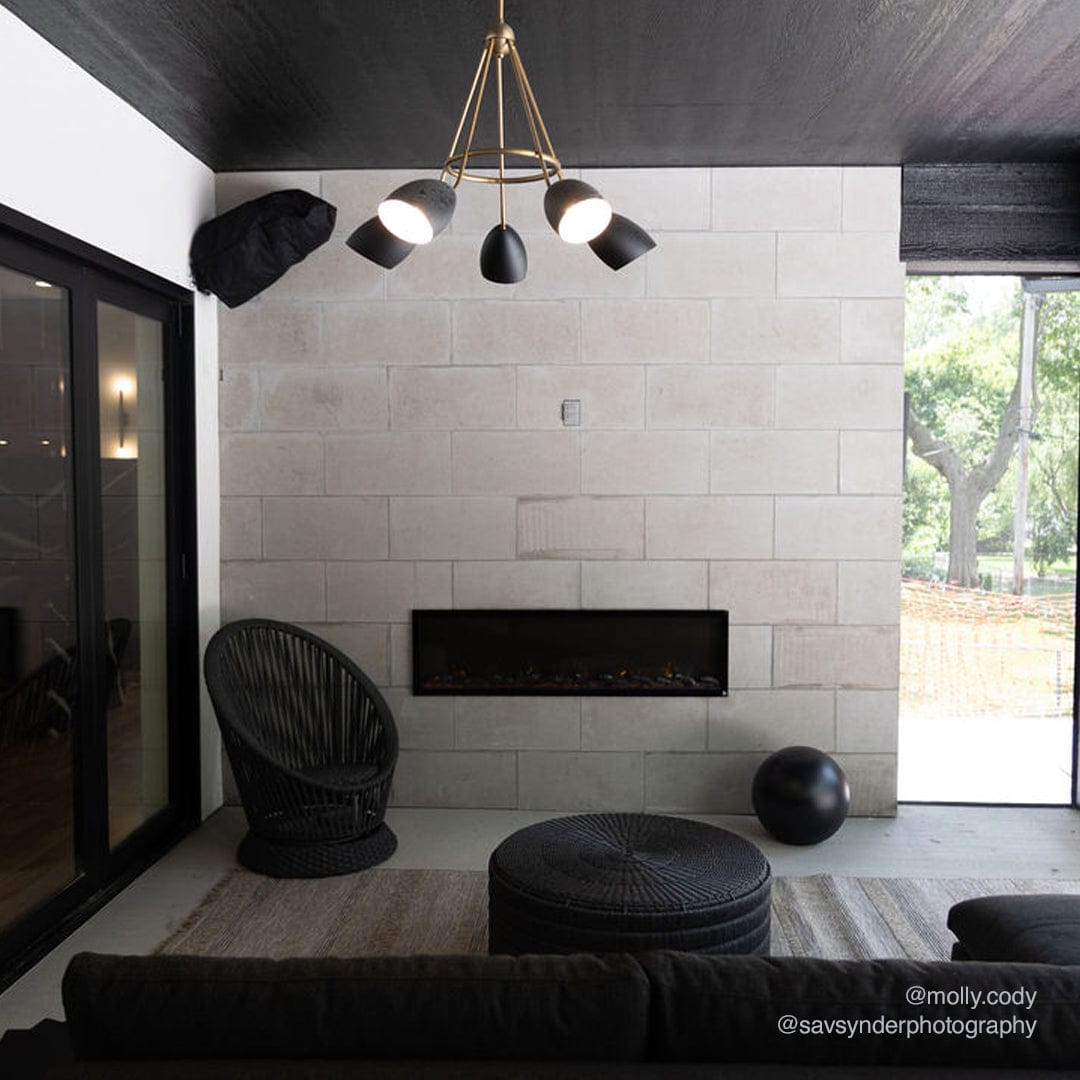 Molly Cody install photo of the Touchstone outdoor Elite electric fireplace