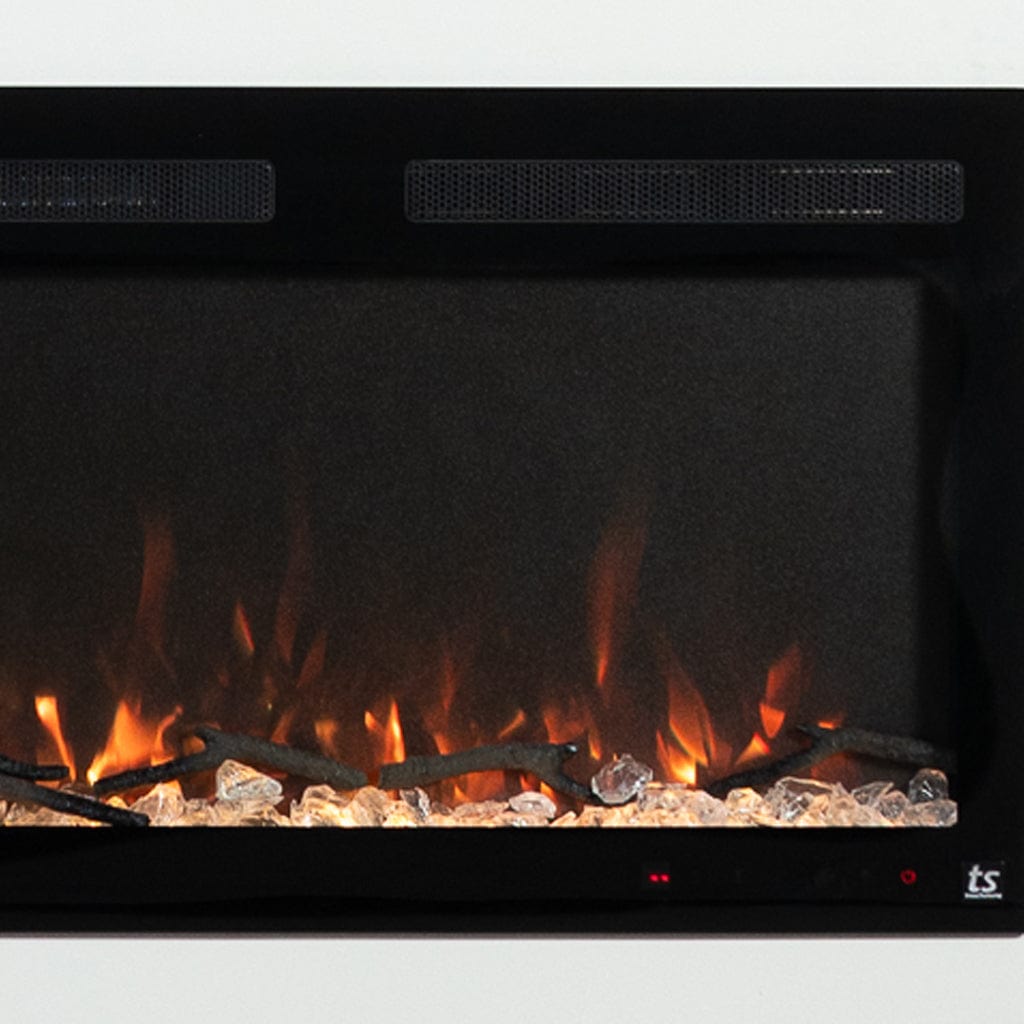 Closeup view of the Sideline Fury® Smart Electric Fireplace LED flame display, shown with crystals and driftwood.