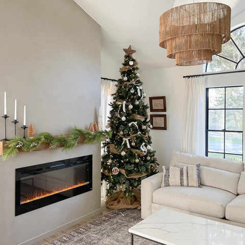 Touchstone Sideline Electric Fireplace in wall with roman clay paint decorated for the holidays by @shorehavenhome