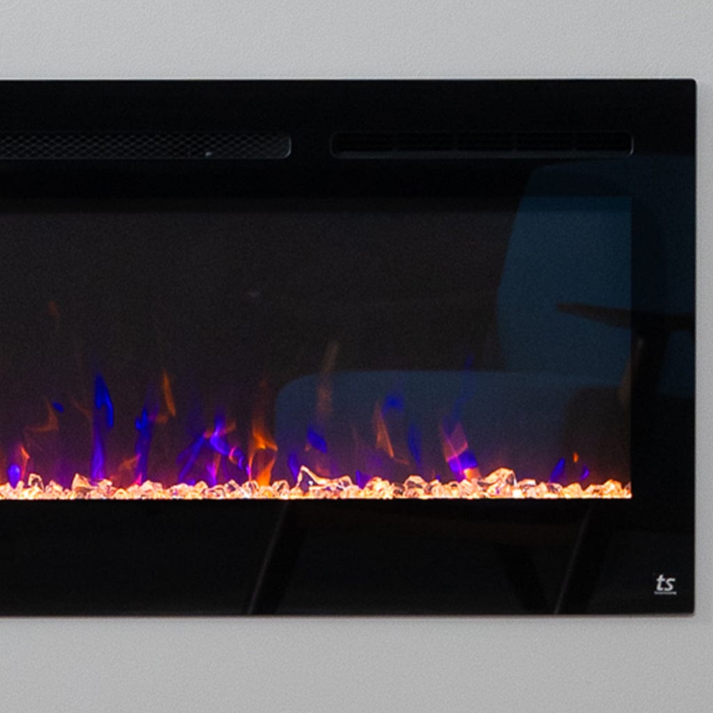 Touchstone Sideline® Smart Electric Fireplace closeup of LED flame display with orange and blue flames.